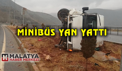 Minibüs yan yattı