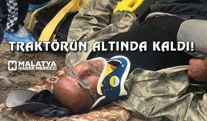 Devrilen traktörün altında kalan sürücü yaralandı