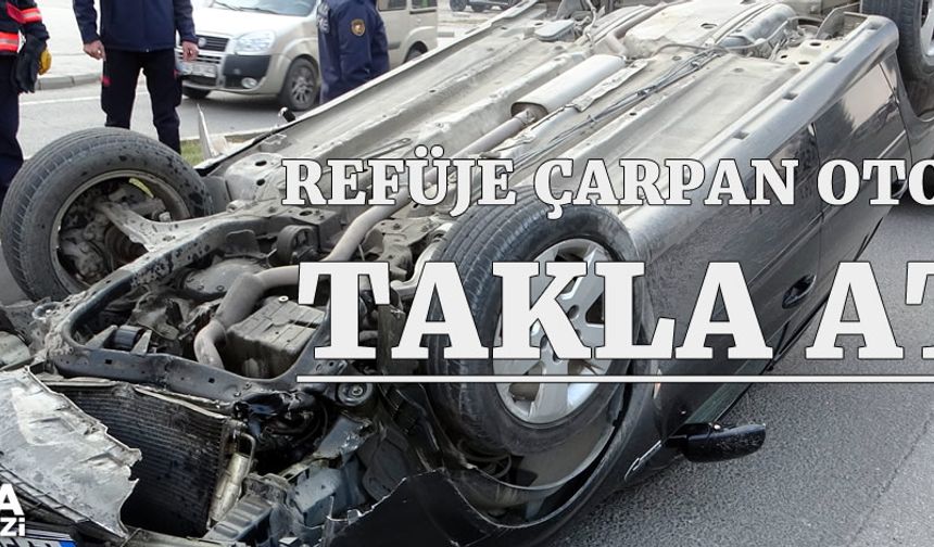 Malatya'da refüje çarpan otomobil takla attı